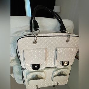 Chanel style TSA approved dog carrier for up to 30lb small dog. Used once.
